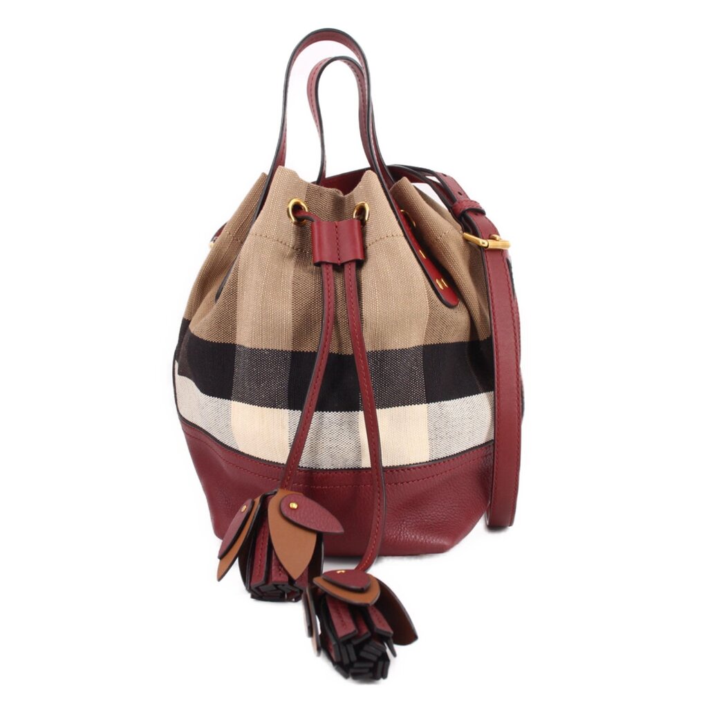 Check canvas bucket crossbody bag with burgundy leather trim and drawstring