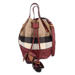 Check canvas bucket crossbody bag with burgundy leather trim and drawstring