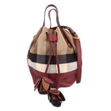 Check canvas bucket crossbody bag with burgundy leather trim and drawstring