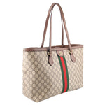 Large tote bag in GG canvas with brown handles, side profile and green-red stripe accent.