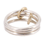 Stacked silver-tone ring with gold-tone twisted top loop, engraved 750
