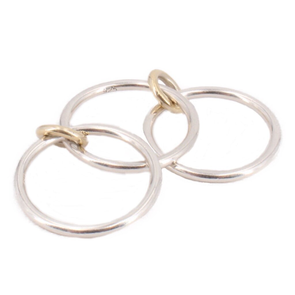 Pair of silver-tone open rings with small gold-tone link loops