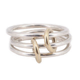 Interlinked silver-tone and gold-tone open rings, engraved 750 on band