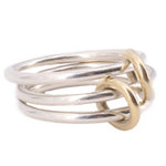 Interlinked silver-tone and gold-tone open rings with crisscross links