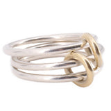 Interlinked silver-tone and gold-tone open rings with crisscross links