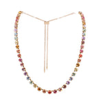 Gold-tone slider necklace with multicolor ombre bead strand and long dangling chain