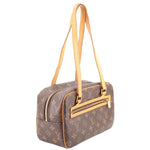 LOUIS VUITTON monogram canvas CITE MM shoulder bag, gold-tone zipper and front pocket