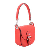 Red leather crossbody bag with top handle straps and front flap logo patch