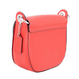 Red leather crossbody bag with side zipper panel and silver key ring hardware