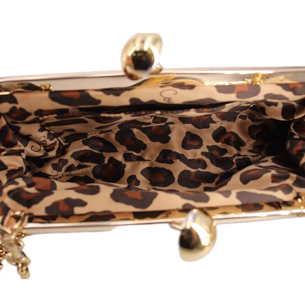 Kisslock shoulder bag interior with leopard-print lining and gold top frame clasp
