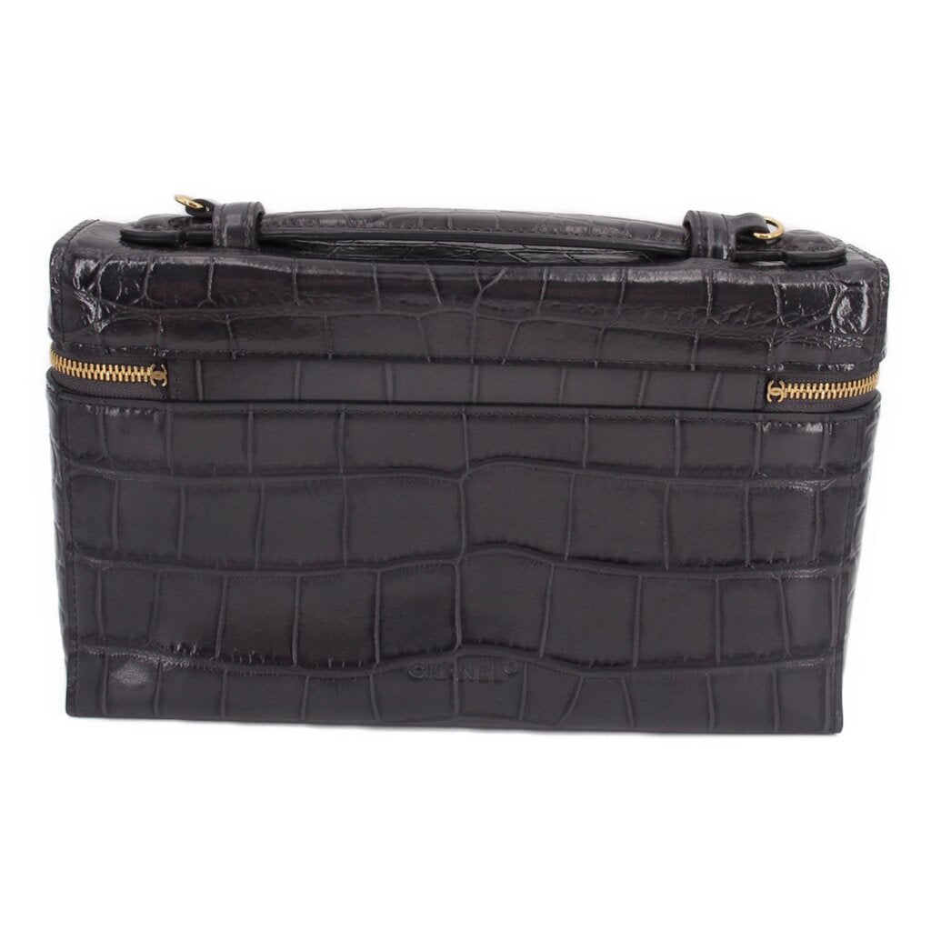 CHANEL vanity crossbody bag with top handle, gold zipper, dark crocodile-textured leather