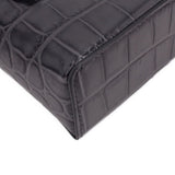 CHANEL vanity crossbody bag corner detail, dark leather texture and stitched edge