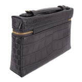CHANEL vanity crossbody bag side view, dark leather with gold-tone zipper and hardware