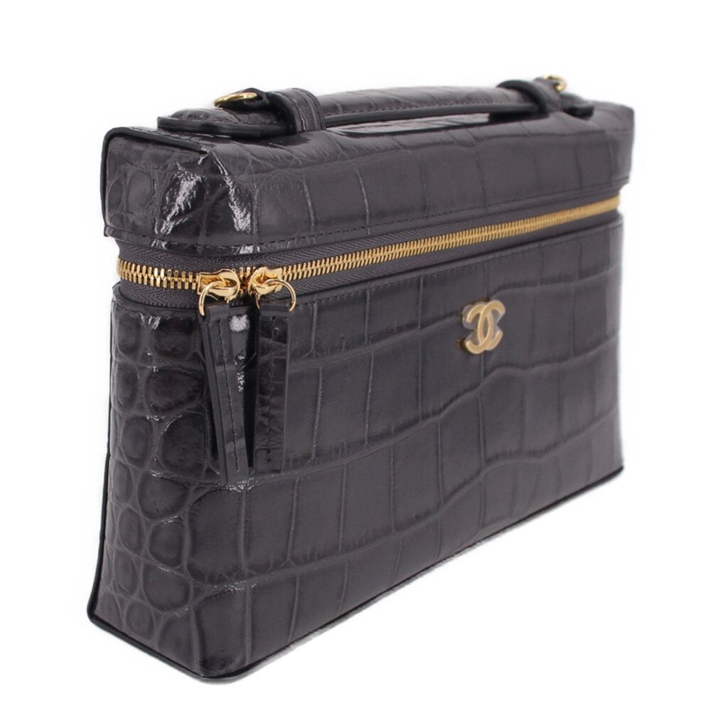 CHANEL vanity crossbody bag, dark leather, gold zipper top and dangling charm