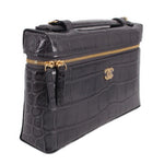 CHANEL vanity crossbody bag, dark leather, gold zipper top and dangling charm