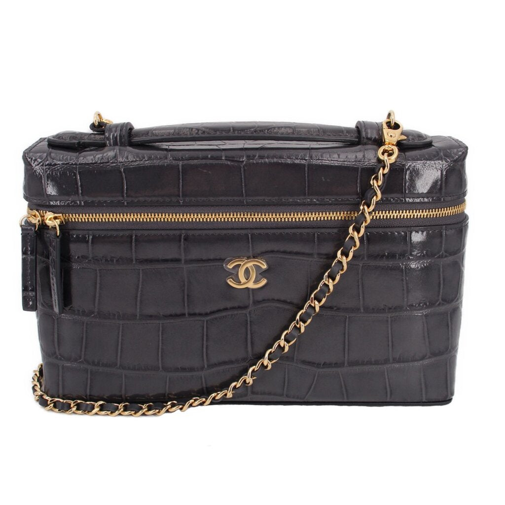 CHANEL vanity crossbody bag in dark textured leather with gold-tone chain and logo