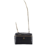 CHANEL vanity crossbody bag with long gold-tone chain strap, dark leather, logo front