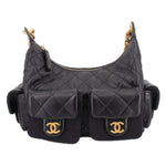 Black quilted leather hobo bag with gold chain handles and front pocket flaps