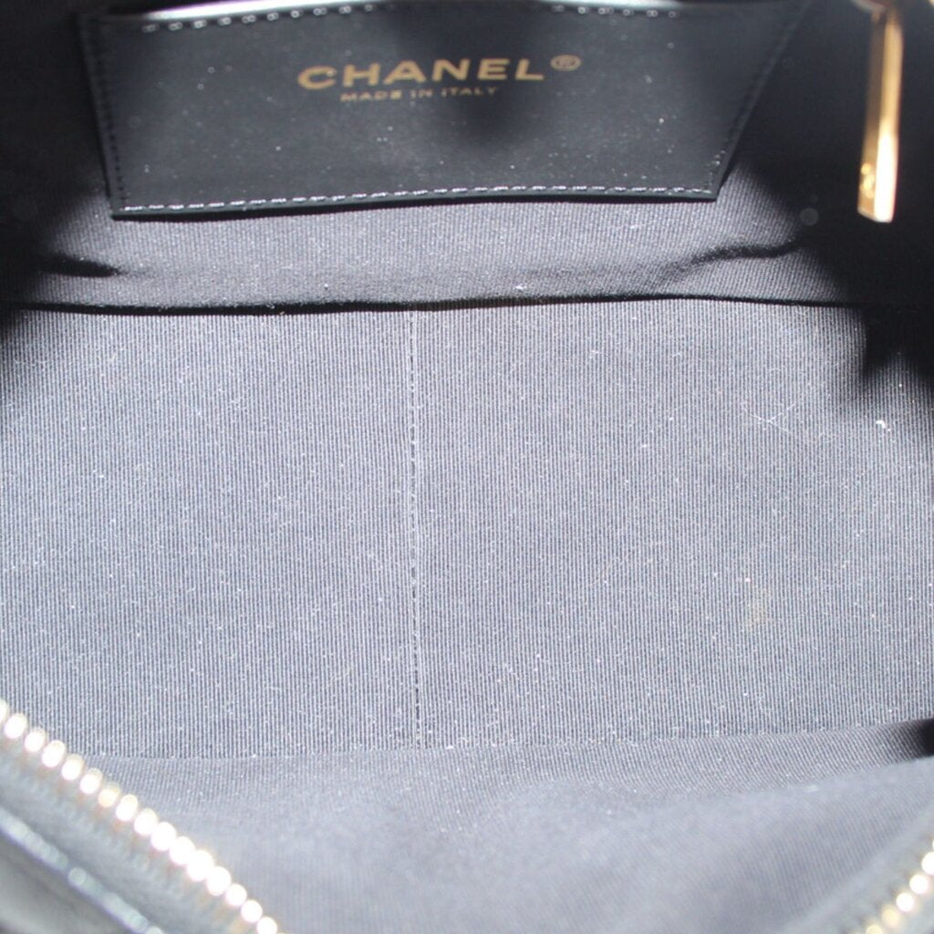 Black hobo bag interior lining with CHANEL label and top zipper