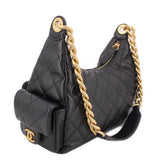 Black quilted hobo bag with gold-tone chain handle and side pocket flap