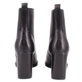 Black heeled ankle booties rear view with pull tabs and stacked block heel