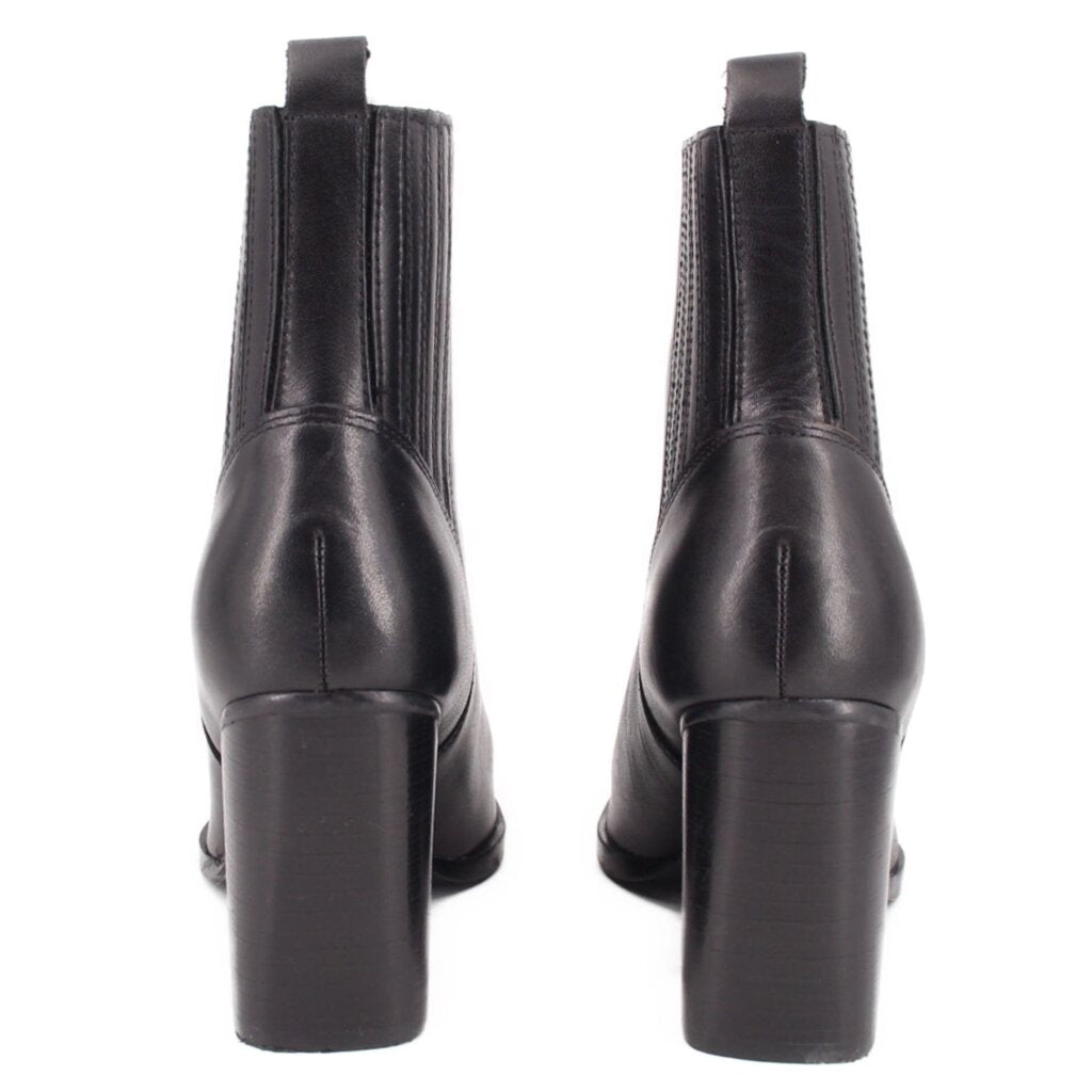 Black heeled ankle boots with elastic gores and back pull tabs.