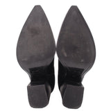 Black heeled booties outsole view with pointed toe and thick heel block base