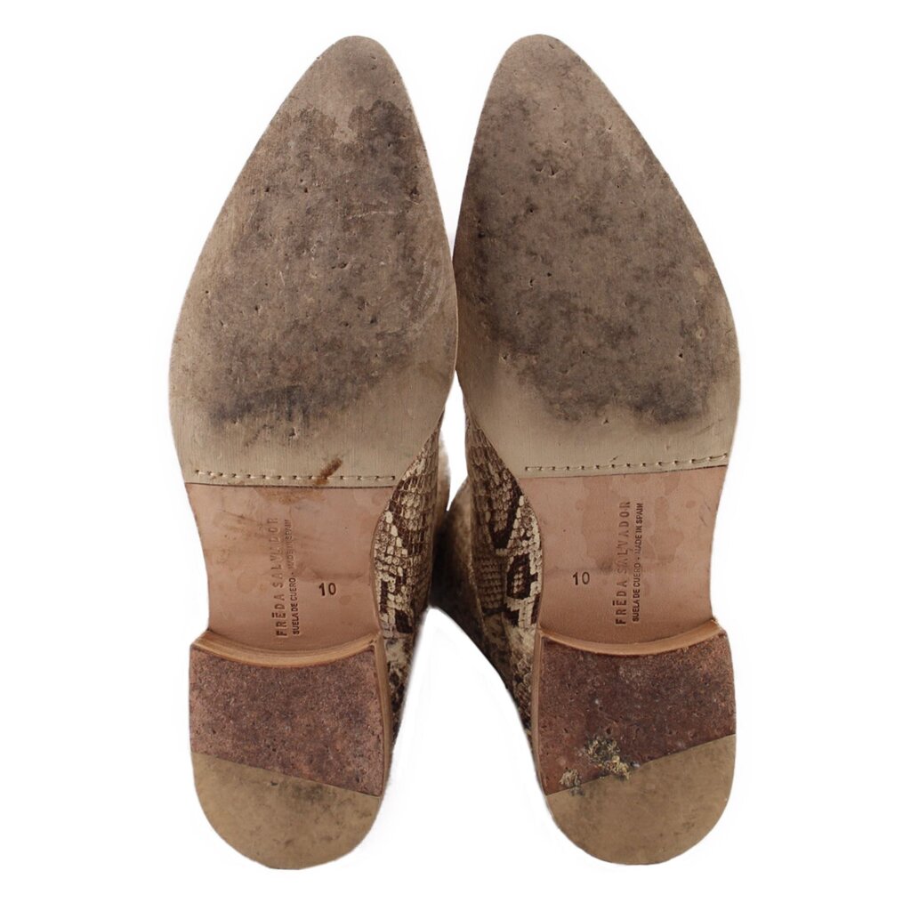 Tall snake-print boots underside view with heel and size label on insole