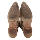 Tall snake-print boots underside view with heel and size label on insole