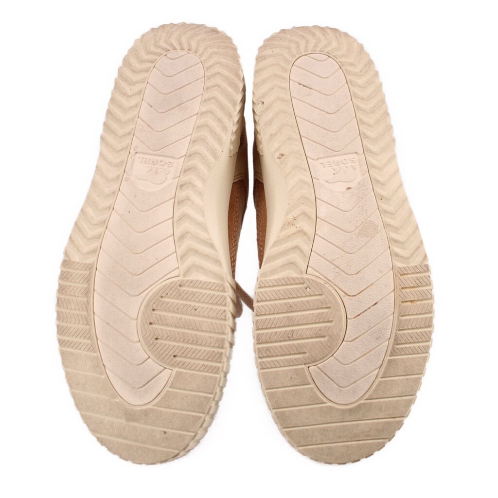 Tan suede sneaker outsoles with textured tread