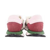 Sneakers with 'new balance' heel branding, pink tabs, maroon and green accents