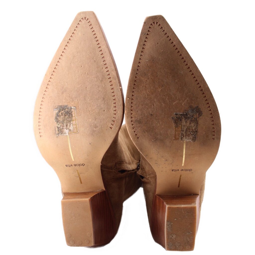 Boot soles underside with stitched suede panels and chunky stacked heel blocks