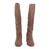Brown suede knee-high heeled boots shown from front angle with block heel