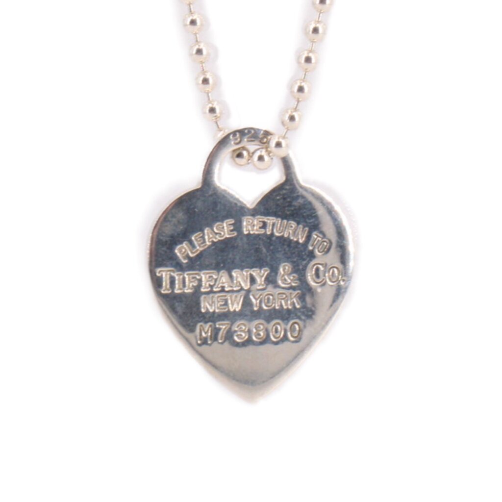 Sterling silver heart tag pendant with TIFFANY & CO engraving on front