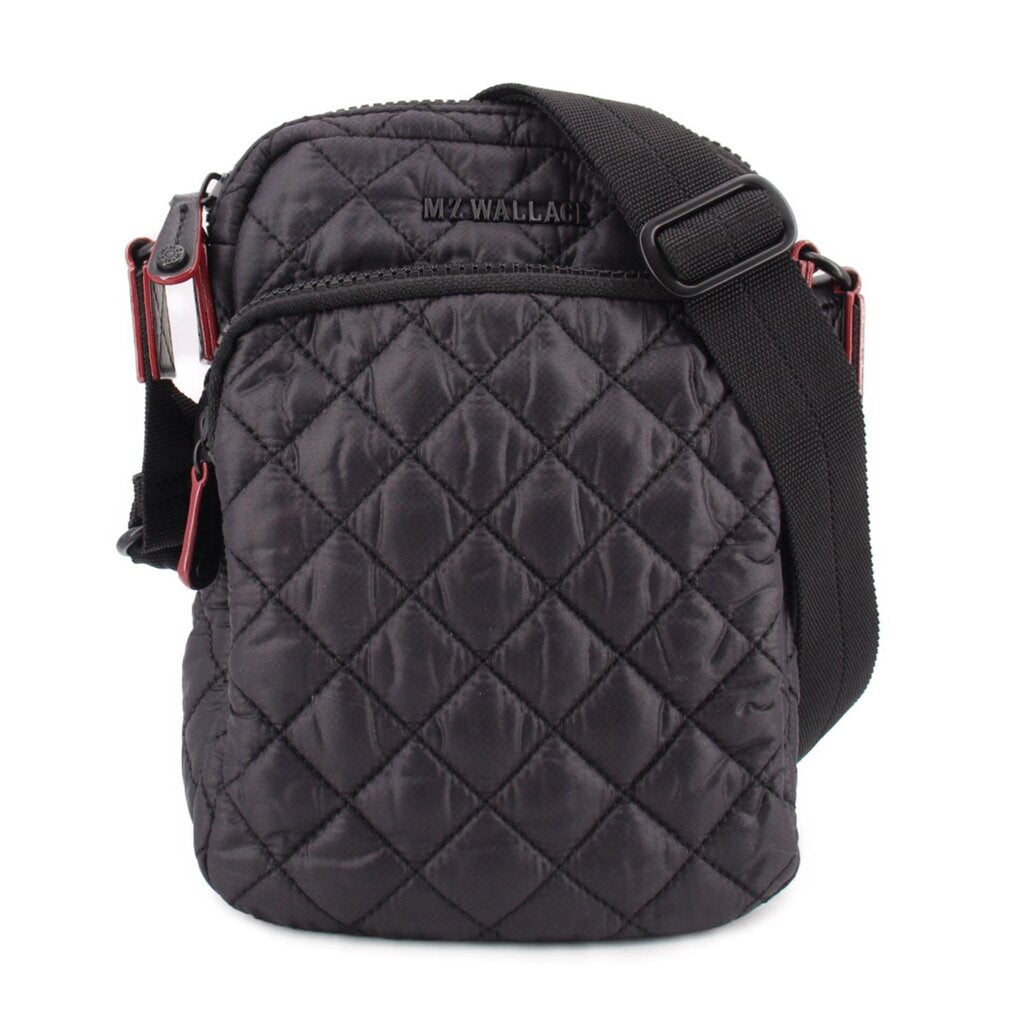 Quilted black phone crossbody bag with top flap and adjustable shoulder strap