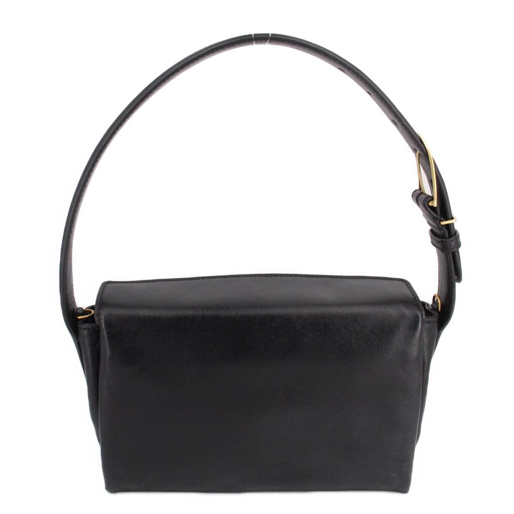 Black boxy crossbody bag with smooth flap and curved shoulder strap, gold-tone details