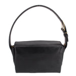 Black boxy crossbody bag with smooth flap and curved shoulder strap, gold-tone details