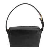 Black boxy crossbody bag with smooth flap and curved shoulder strap, gold-tone details