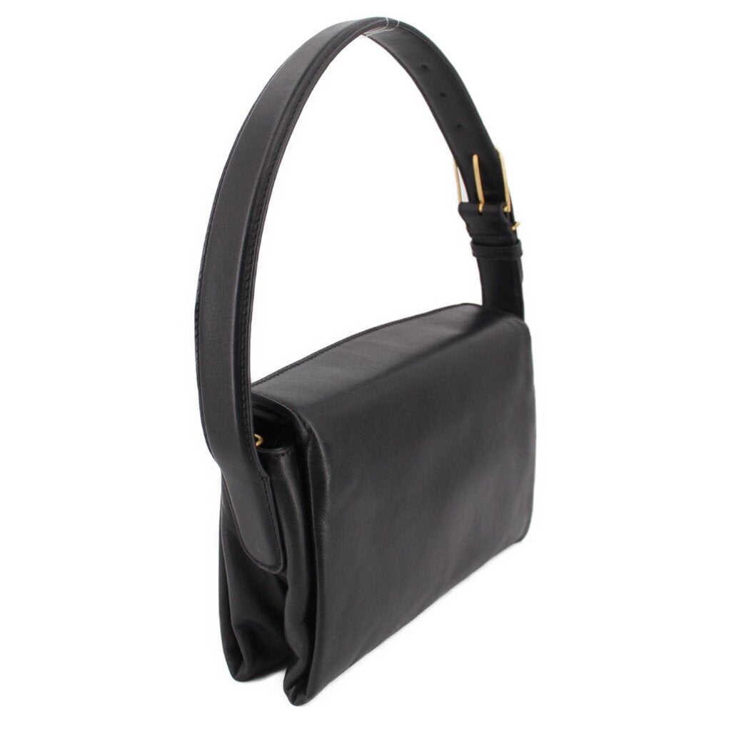 Black boxy crossbody bag on curved handle strap with side pocket detail and gold hardware