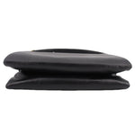 Black boxy crossbody bag close-up of layered flap top with smooth leather finish