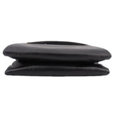 Black boxy crossbody bag close-up of layered flap top with smooth leather finish