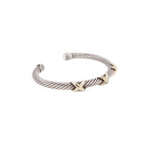Sterling silver cable bracelet with 14K gold knot detail and ribbed end caps