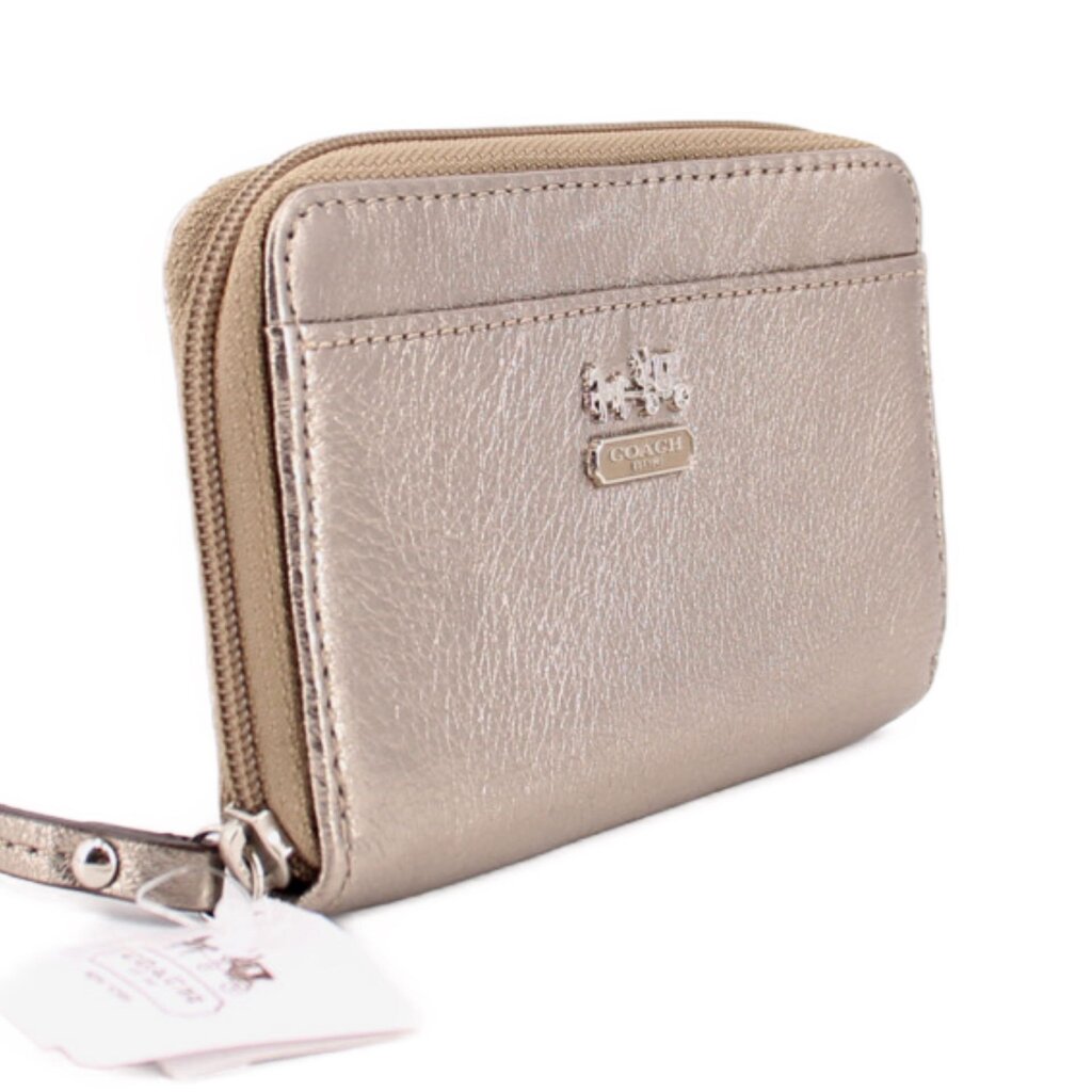 Metallic gold leather small wallet with zip closure and COACH logo