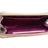 Metallic gold zip wallet interior with purple lining and card slots