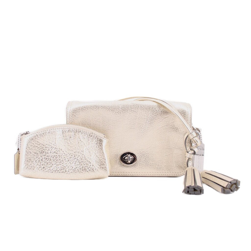 Coach Penny crossbody bag with pouch, metallic gold, front flap and chain tassel.