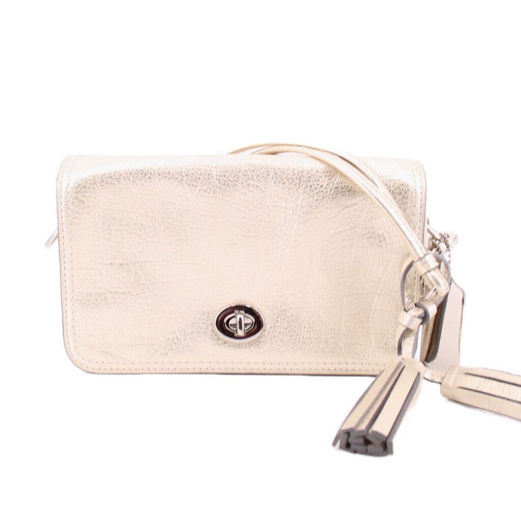 Coach Penny crossbody with pouch, metallic gold, front flap with tassel zipper pull.