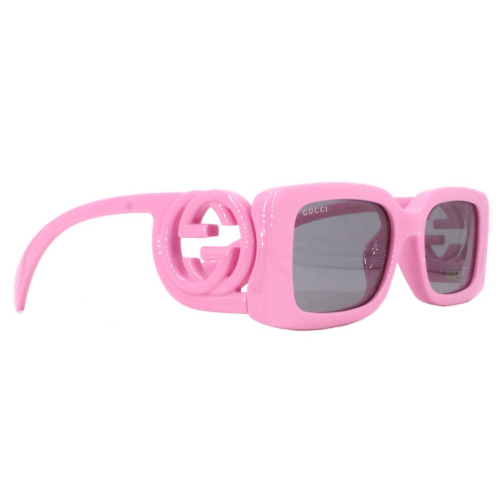 GUCCI pink sunglasses with dark lenses and logo temple, side view