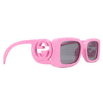 GUCCI pink sunglasses with dark lenses and logo temple, side view