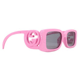 GUCCI pink sunglasses with dark lenses and logo temple, side view