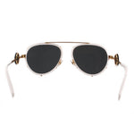 White aviator sunglasses with black lenses and gold-tone bridge details